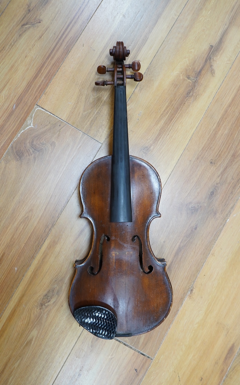 An early 20th century cased Welsh violin, the handwritten label inside the body reads; ‘James Parkinson, Llandudno No.9, 1921’, with a single piece back, inlaid stringing to the edge of the body, length of body 35.5cm, t